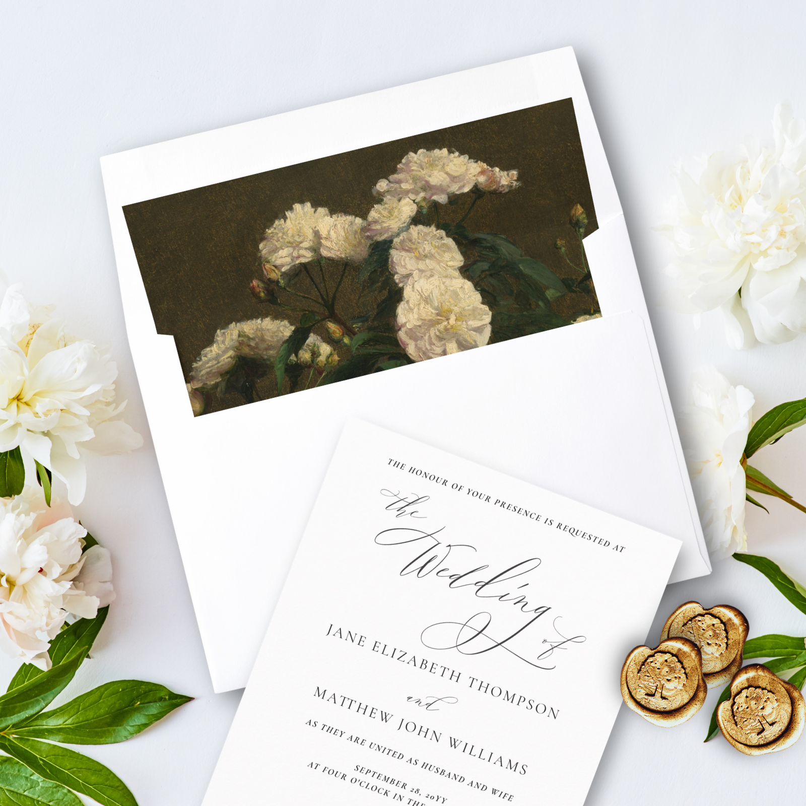 Fine art wedding invitation envelope with white florals